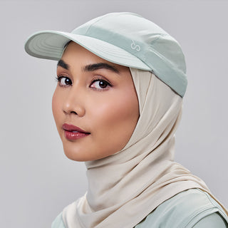 Mint-colored sport cap by TudungPeople, lightweight accessories with a curved brim and adjustable strap for a comfortable fit.