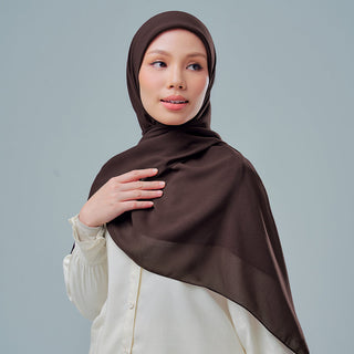 Nisa 2.0 in Carafe from TudungPeople Signature collection, featuring a stylish fabric hijab displayed in a sleek carafe-shaped container.