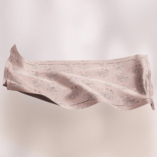 TudungPeople Kuntum print hijab in vibrant floral design, soft fabric with intricate pattern detail.