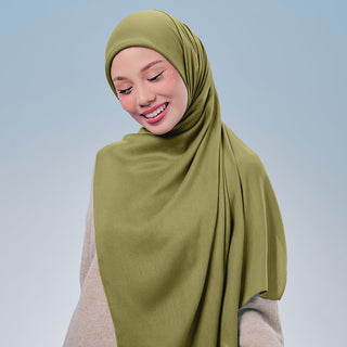 TudungPeople Signatures Modal in Matcha fabric, showing a close-up of the soft, smooth green textured material.