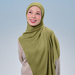 TudungPeople Signatures Modal in Matcha fabric, showcasing smooth, soft material with subtle green hue and elegant drape.