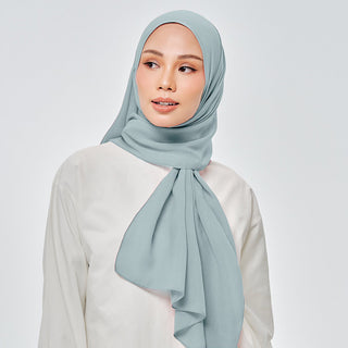 TudungPeople Suri in Mermaid signature hijab featuring a vibrant mermaid pattern on lightweight fabric.