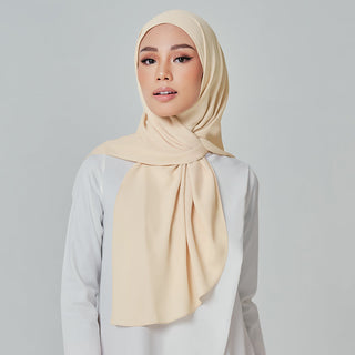 Niya Chiffon 2.0 instant hijab in Parmesan color, lightweight and stylish TudungPeople headscarf laid flat on a white background.