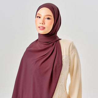 Niya Chiffon 2.0 instant hijab in Sangria color, lightweight chiffon fabric, styled in a flowing hijab look.