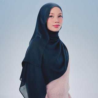 Close-up of TudungPeople Stellar Modal Signature fabric in a rich, smooth textile with subtle shimmer.