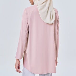 Pink Dryfit tank top by TudungPeople, athletic apparel with moisture-wicking fabric, shown on a hanger.