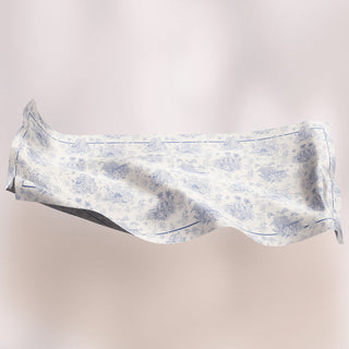 Colorful Telang print shawl by TudungPeople, showcasing intricate floral patterns on lightweight fabric.