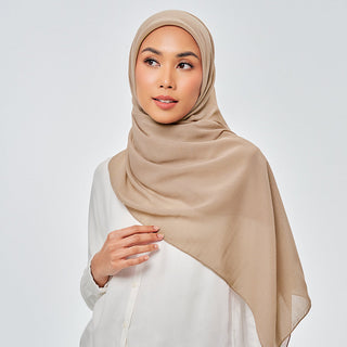 TudungPeople Suri in Trail Signatures hijab in a stylish trail pattern, shown in a close-up image with intricate fabric details.
