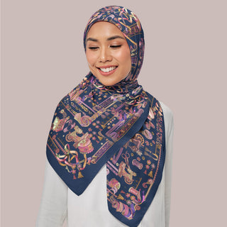 Dark navy square print from TudungPeople's Atelier collection, featuring intricate design and elegant fabric details.