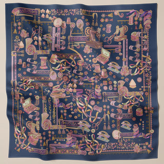Navy Atelier print hijab by TudungPeople featuring a dark blue square design with intricate patterns.