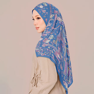 Blue Atelier print by TudungPeople showing intricate design on fabric with soft dusty blue tones.