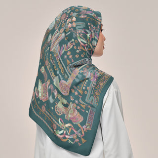 Teal-colored Atelier print from TudungPeople, square layout, featuring intricate design details in a vibrant teal shade.