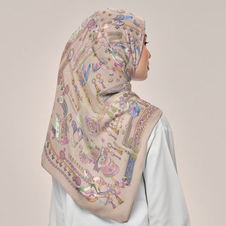 TudungPeople Atelier beige print hijab in nude brown color, showcasing the square design and elegant fabric texture.