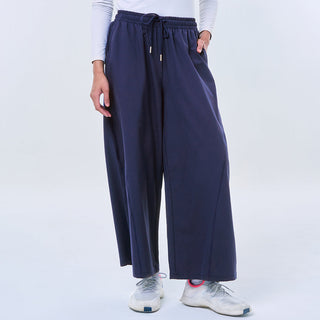 Navy Panel Pants by TudungPeople, stylish and comfortable apparel with paneled design, shown in a natural pose.