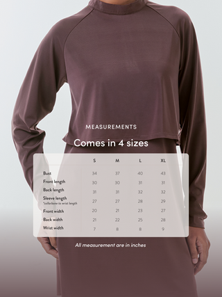 Size chart for TudungPeople black Cape Swimwear Top, displaying measurement guidelines and fit details for apparel sizing.