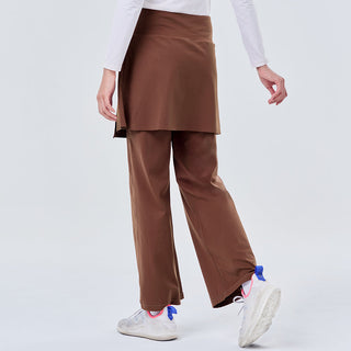 Dark brown TudungPeople active skirt pants, stretchy and comfortable for active wear, shown on a model.