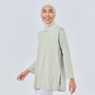 Sage-colored TudungPeople Tank Dryfit Top for women, sleeveless athletic apparel with moisture-wicking fabric.