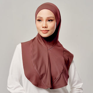 Active Najwa Sport Wave in copper by TudungPeople, showing the stylish copper-colored hijab with wave design in a close-up shot.